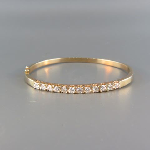 Appraisal: Diamond Bangle Bracelet round diamonds totaling carat k yellow gold