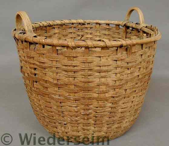 Appraisal: Woven splintwood potato basket with bentwood handles h x dia