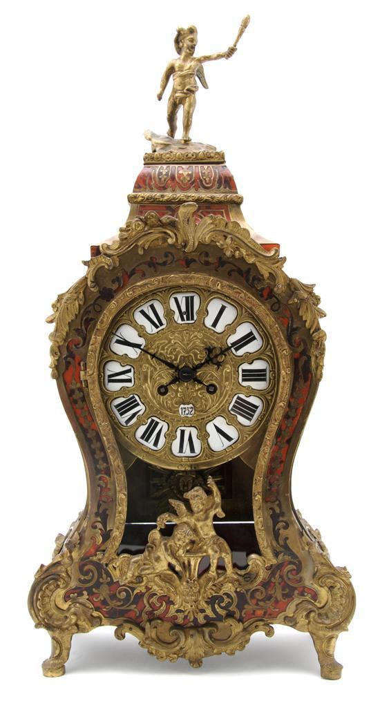 Appraisal: Louis XV Style Boulle Marquetry Bracket Clock having torch-bearing putto