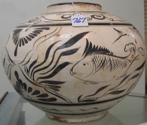 Appraisal: CHINESE EARTHENWARE POT the distinctive cream glaze hand painted with