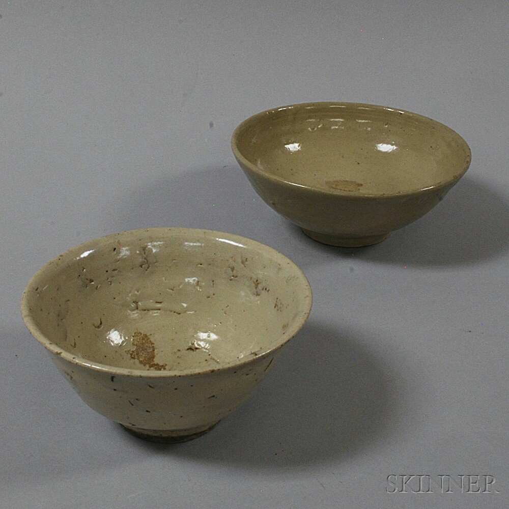 Appraisal: Two Gray-glazed Stoneware Bowls a teabowl with unglazed base and