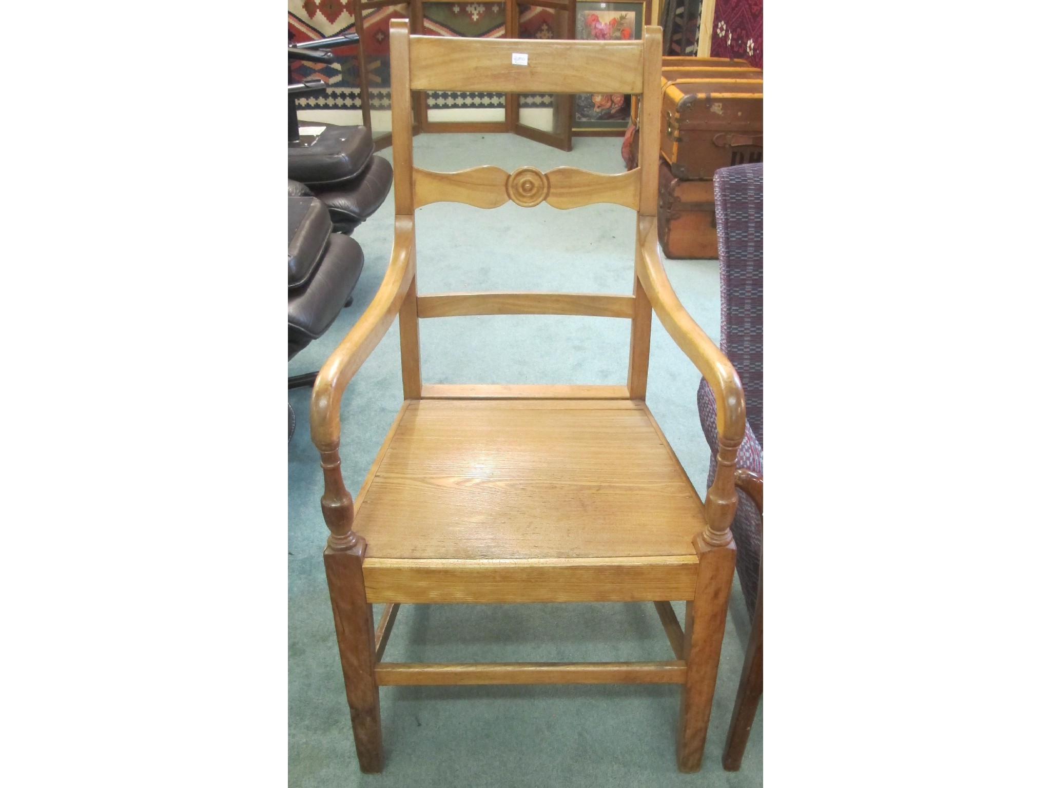 Appraisal: A Victorian beech kitchen armchair