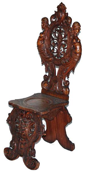 Appraisal: A Baroque style carved walnut armchair