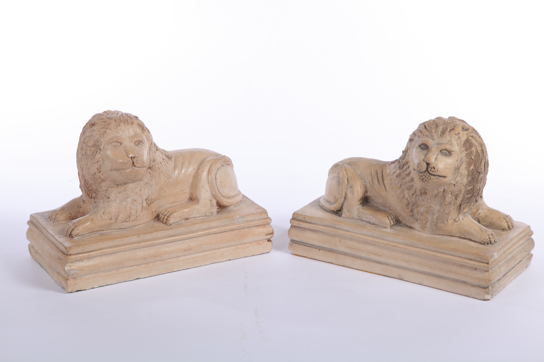 Appraisal: PAIR OF POTTERY LIONS American late th century white clay