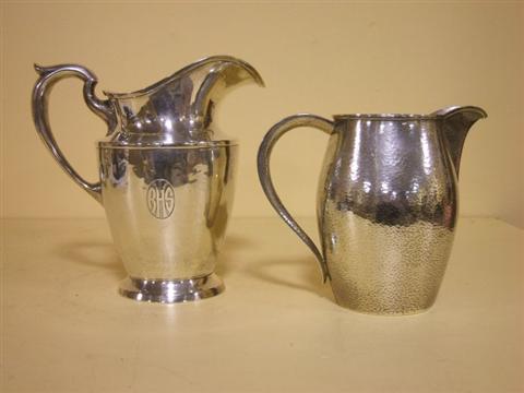 Appraisal: TWO AMERICAN SILVER WATER PITCHERS Comprising a Schofield silver water