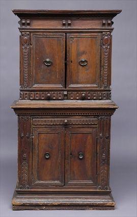 Appraisal: ITALIAN BAROQUE CARVED WALNUT ASSEMBLED TWO-PART CABINET The upper part