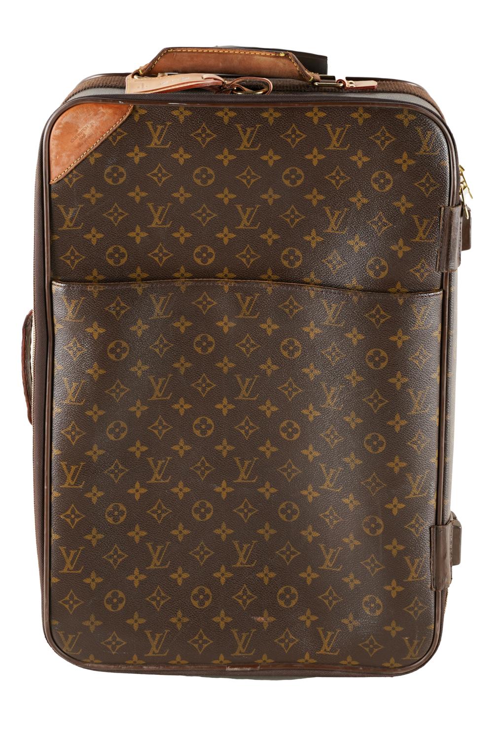 Appraisal: LOUIS VUITTON MONOGRAM CANVAS TROLLEY BAGwith monogrammed leather luggage tag