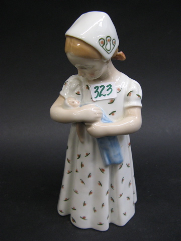 Appraisal: ROYAL COPENHAGEN GLAZED CHILD FIGURE - H The girl child