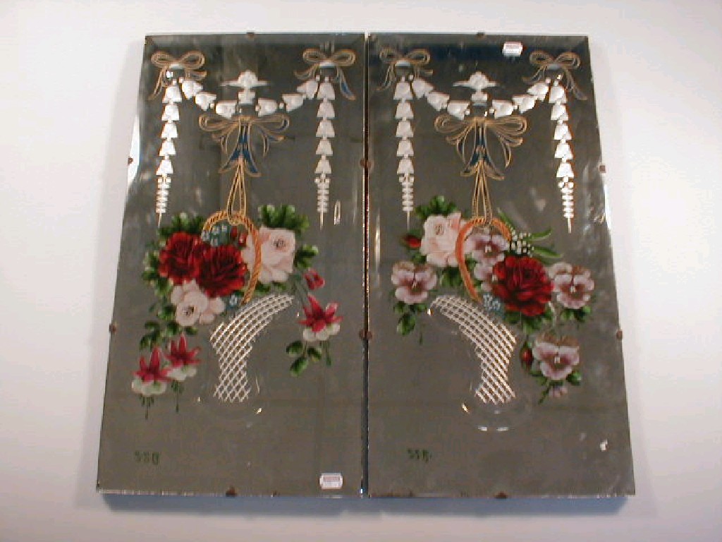 Appraisal: A pair of late Victorian rectangular wall mirrors with bevelled