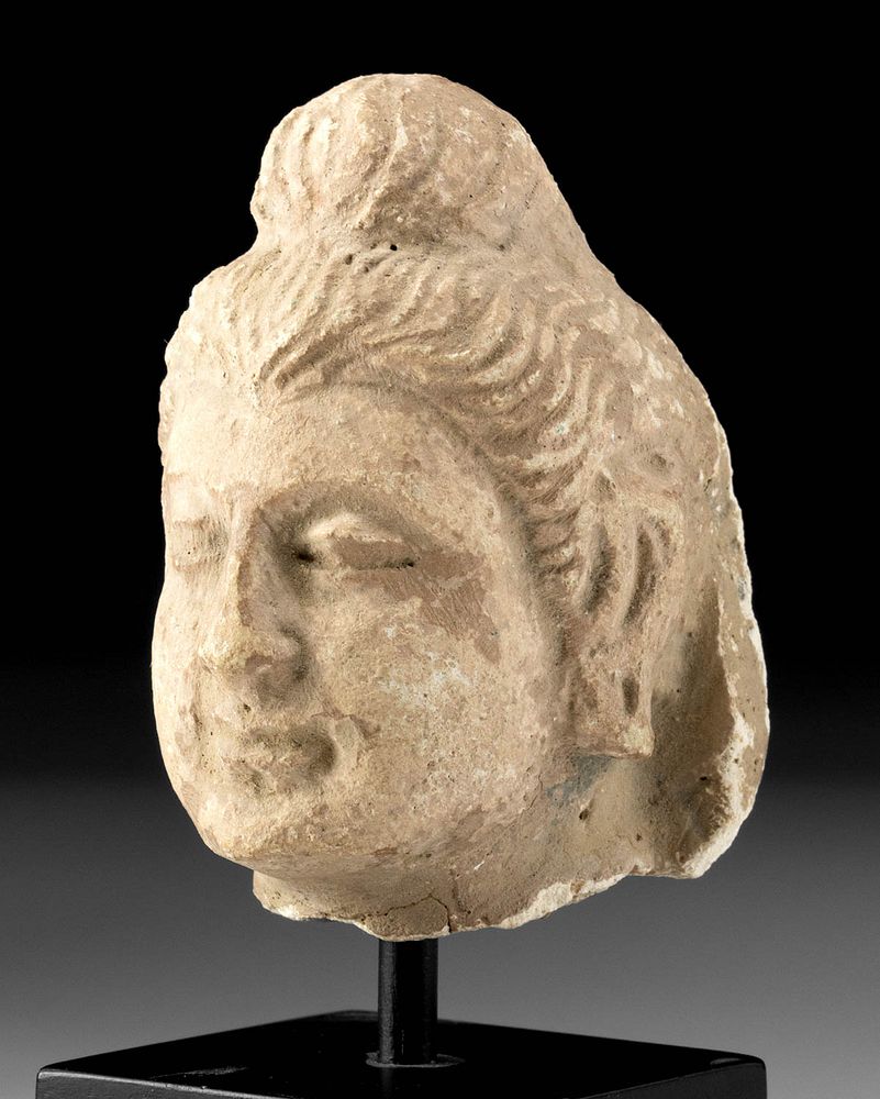 Appraisal: Ancient Gandharan Stucco Buddha Head Originally Listed At Central Asia