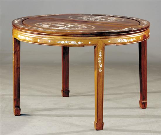 Appraisal: Chinese mahogany and mother-of-pearl dining table circular frame-and-panel top fitted