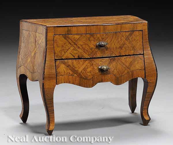 Appraisal: An Italian Inlaid and Figured Walnut Commode two drawers on