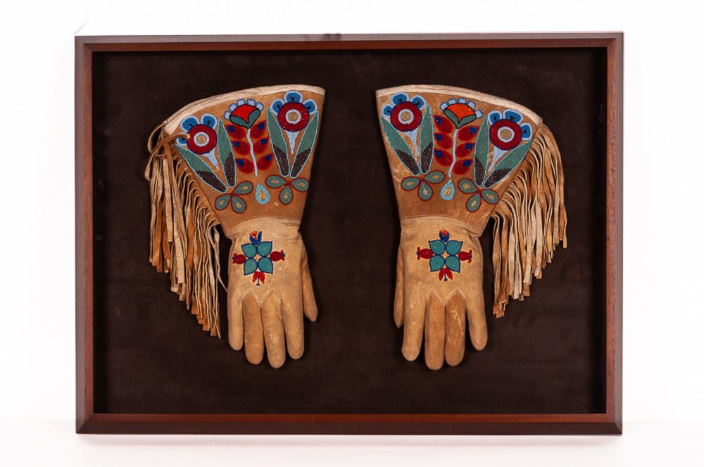 Appraisal: PAIR OF PLAINS INDIAN GAUNTLETSdeerskin with tan cloth lining beaded