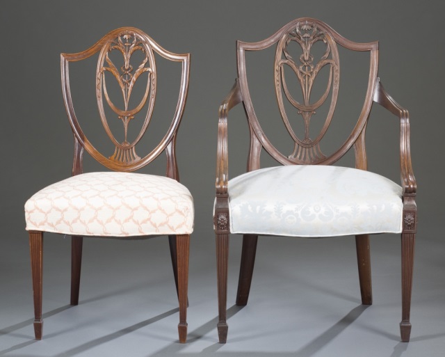 Appraisal: Two Chippendale-Style Mahogany Chairs One arm and one side Shield