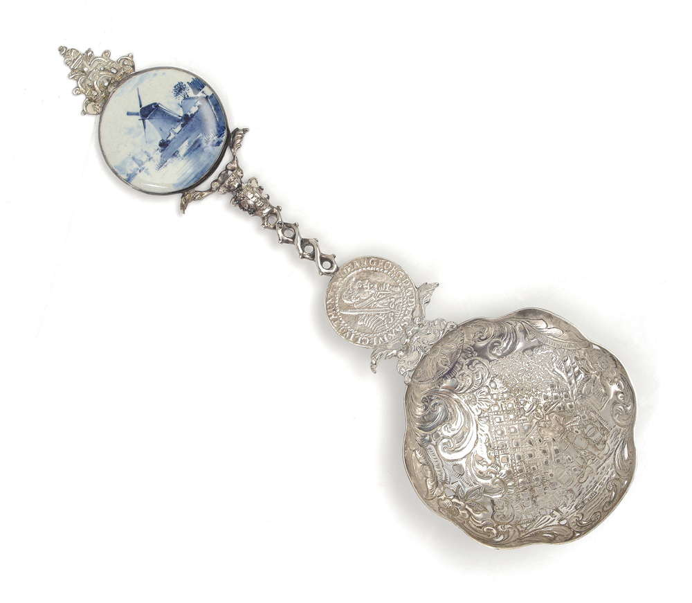 Appraisal: DUTCH SILVER SPOON WITH DELFT INSERT Finial with windmill scene