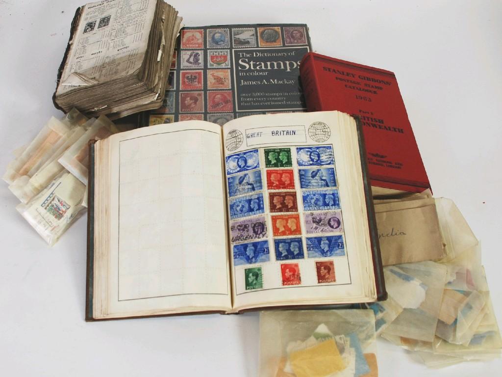 Appraisal: AN ACCUMULATION OF STAMPS many in pockets plus the 'Facility'