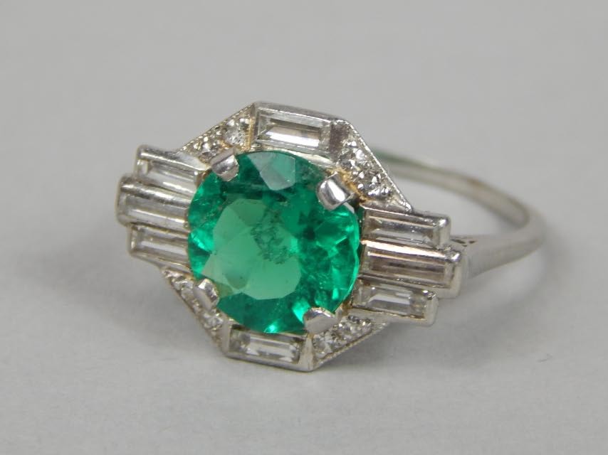 Appraisal: An Art Deco style emerald and diamond set ring the