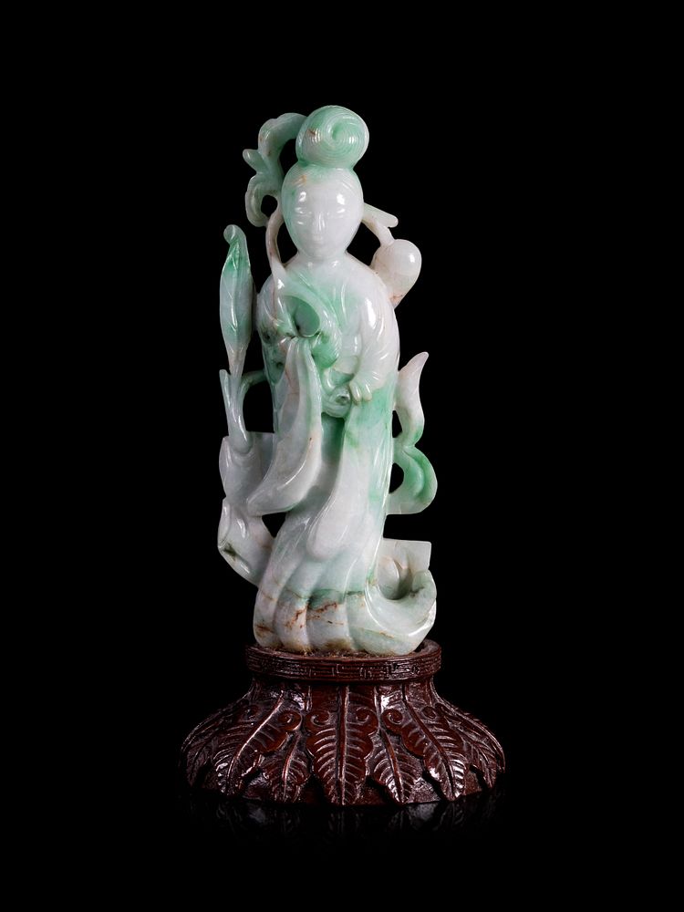 Appraisal: An Apple Green and White Jadeite Figure of a Lady