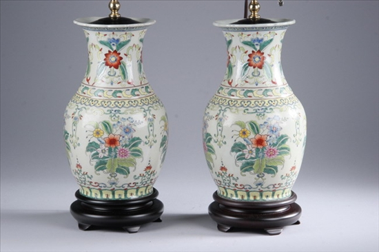 Appraisal: PAIR CHINESE FAMILLE ROSE PORCELAIN VASES Floral decoration electrified -