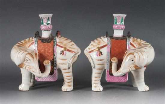 Appraisal: Pair of Mottahedeh porcelain elephant joss stick holders in the