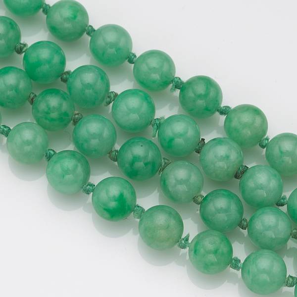 Appraisal: A continuous strand of jadeite jade beads beads measuring approximately