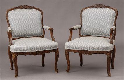 Appraisal: PAIR OF REGENCY-STYLE CARVED BEECHWOOD FAUTEUILS A LA REINE Each