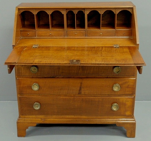 Appraisal: New England tiger maple slant-front desk c with a pigeonholed