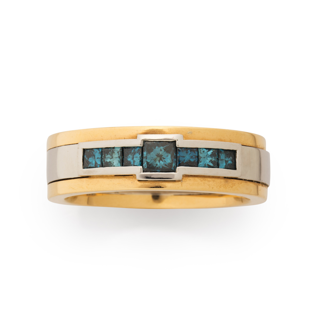 Appraisal: A BLUE DIAMOND AND EIGHTEEN KARAT BI-COLOR GOLD RING A