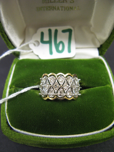 Appraisal: DIAMOND AND FOURTEEN KARAT GOLD RING set with round-cut diamonds