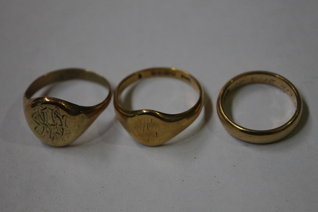 Appraisal: TWO CT GOLD SIGNET RINGS and an ct gold wedding