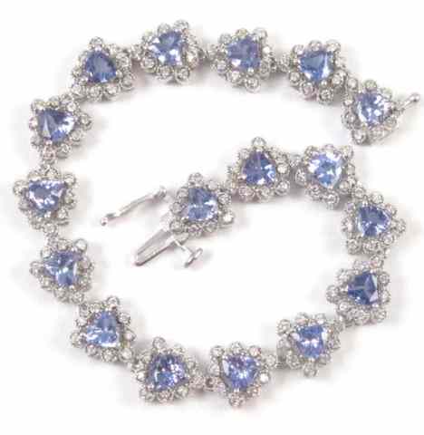 Appraisal: TANZANITE AND DIAMOND BRACELET k white gold with triangle mixed-cut