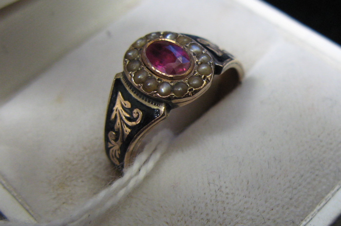 Appraisal: RUBY SEED PEARL AND NINE KARAT GOLD RING set with