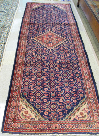 Appraisal: THREE PERSIAN BLUE FIELD AREA RUGS northwestern Iran all hand