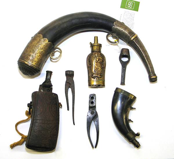 Appraisal: A group of powder flasks and firearms accessories Comprising th