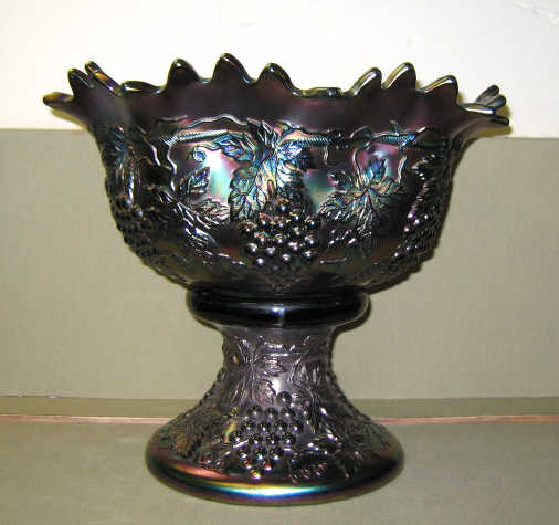 Appraisal: NORTHWOOD CARNIVAL GLASS PUNCH BOWL Two-piece purple Grape and Cable