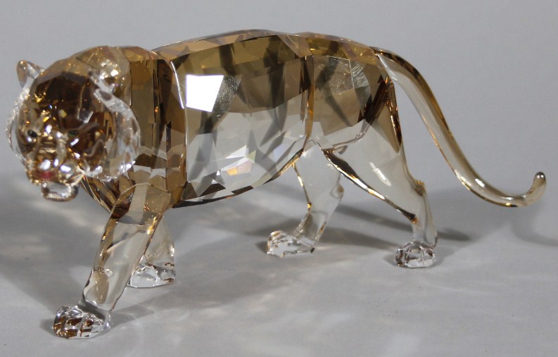 Appraisal: A Swarovski crystal endangered wildlife figure tiger in blue and