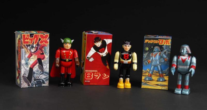 Appraisal: Lot of Tin Superhero Wind-Up Toys Description Japanese Made by