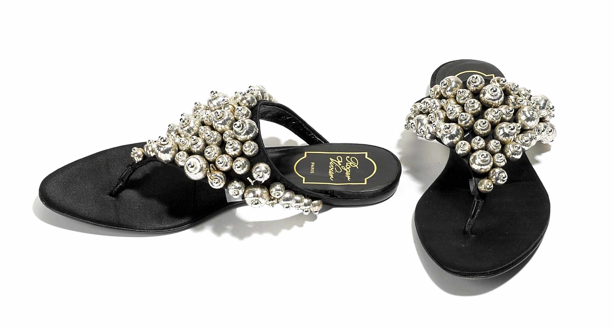 Appraisal: A pair of Roger Vivier black sandals adorned with silver