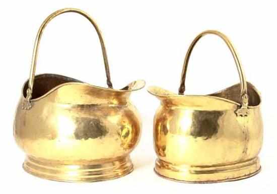 Appraisal: English brass coal scuttles similar forms with pivoting handle and