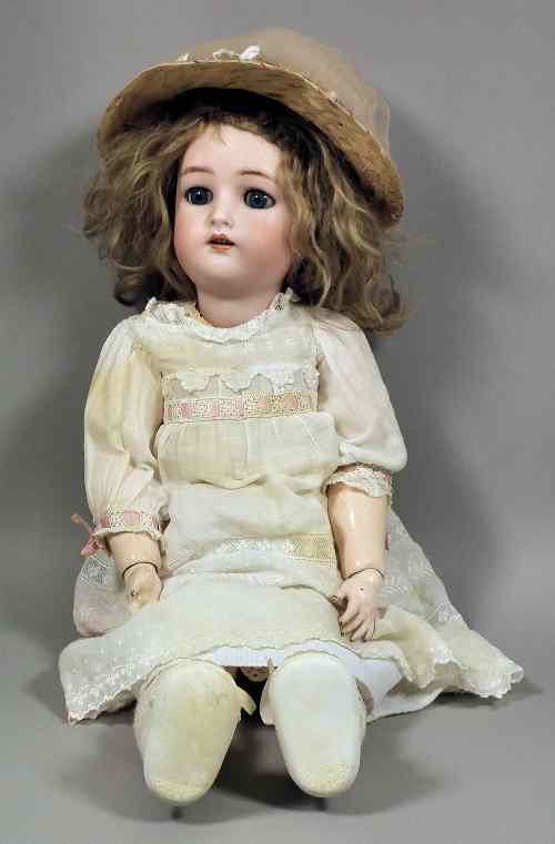 Appraisal: A Simon Halbig bisque headed doll with closing blue eyes