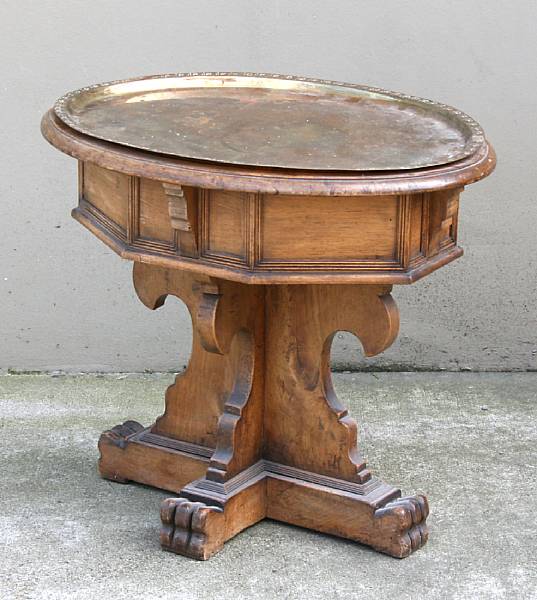 Appraisal: An Italian Baroque style walnut and brass tray top table