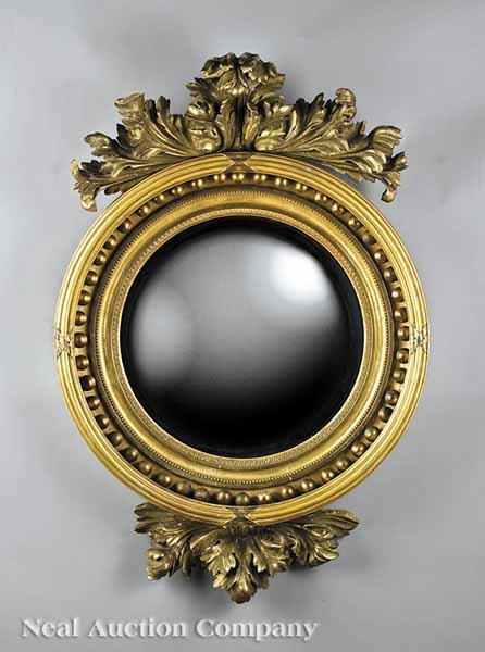 Appraisal: An English or American Carved Giltwood Bullseye Mirror c the