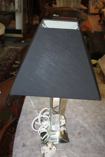 Appraisal: A PAIR OF CONTEMPORARY SILVERED TABLE LAMPS with shades