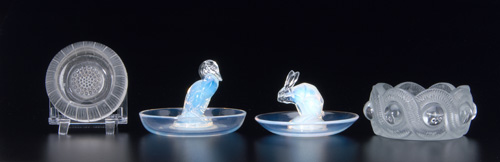 Appraisal: R LALIQUE Four ashtrays comprising Canard and Lapin both opalescent