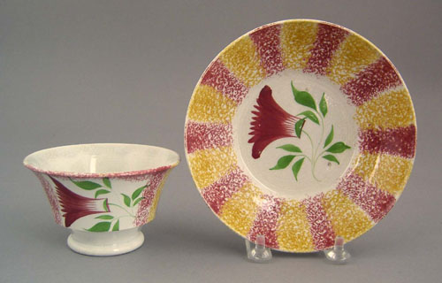 Appraisal: Yellow and red rainbow spatter cup and saucer th c