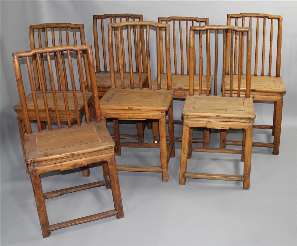 Appraisal: SET OF TWELVE CHINESE PINE SPINDLE BACK DINING CHAIRS late