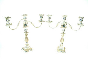 Appraisal: A pair of Georgian style plated twin branch candelabra with