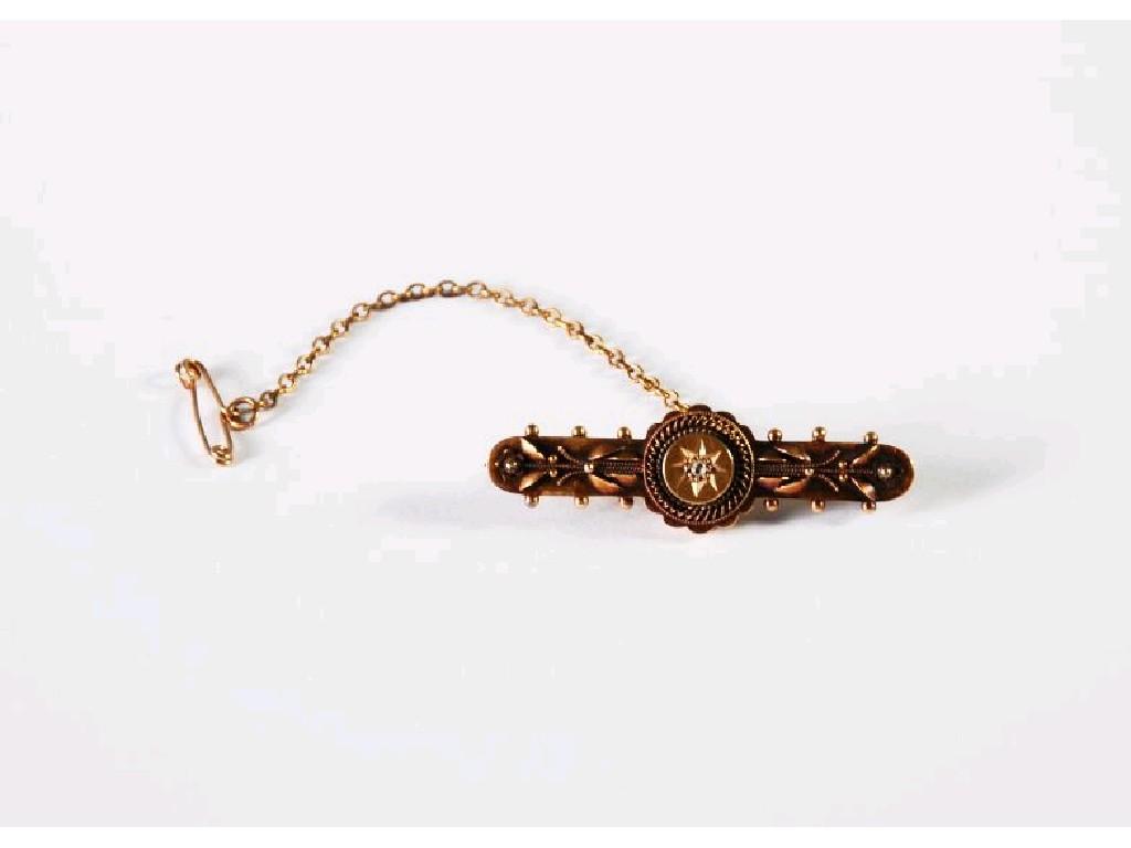 Appraisal: EARLY TWENTIETH CENTURY ct GOLD PROPELLER SHAPED BROOCH with applied