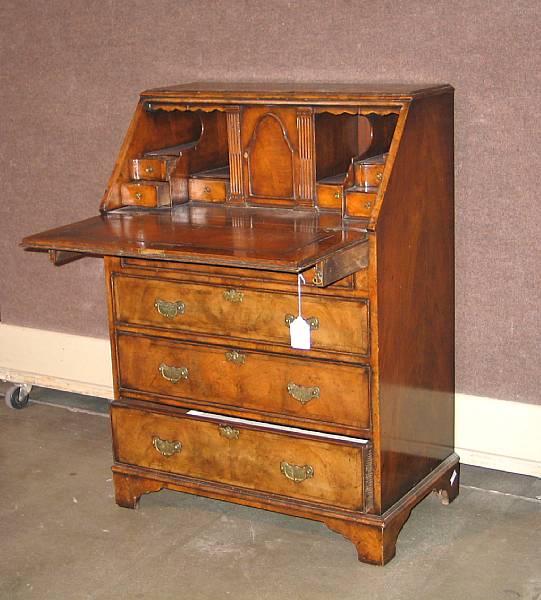 Appraisal: A George III style walnut slant front desk mid th