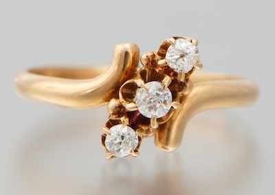 Appraisal: A Child's Diamond Ring k yellow gold bypass design ring